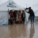 Displaced Gazans rain impact