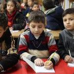 Children in Gaza return to school