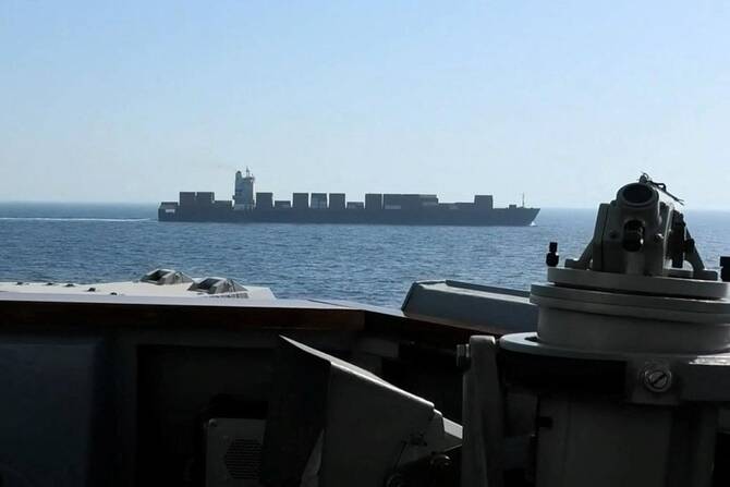 The US says it has attacked and seized an Iranian-flagged cargo ship near the Strait of Hormuz that tried to get around its blockade of Iranian ports. (Reuters)